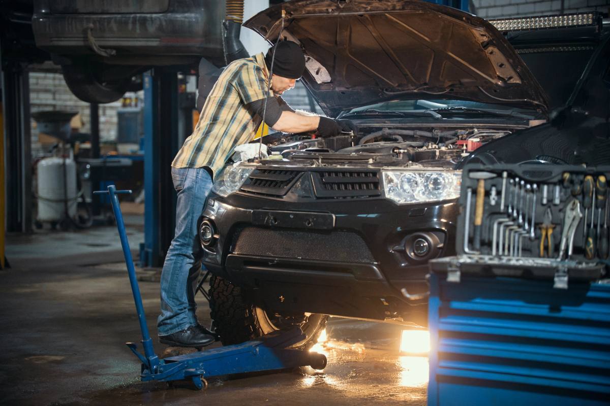 Photo: a technician performing an undercarriage repair
